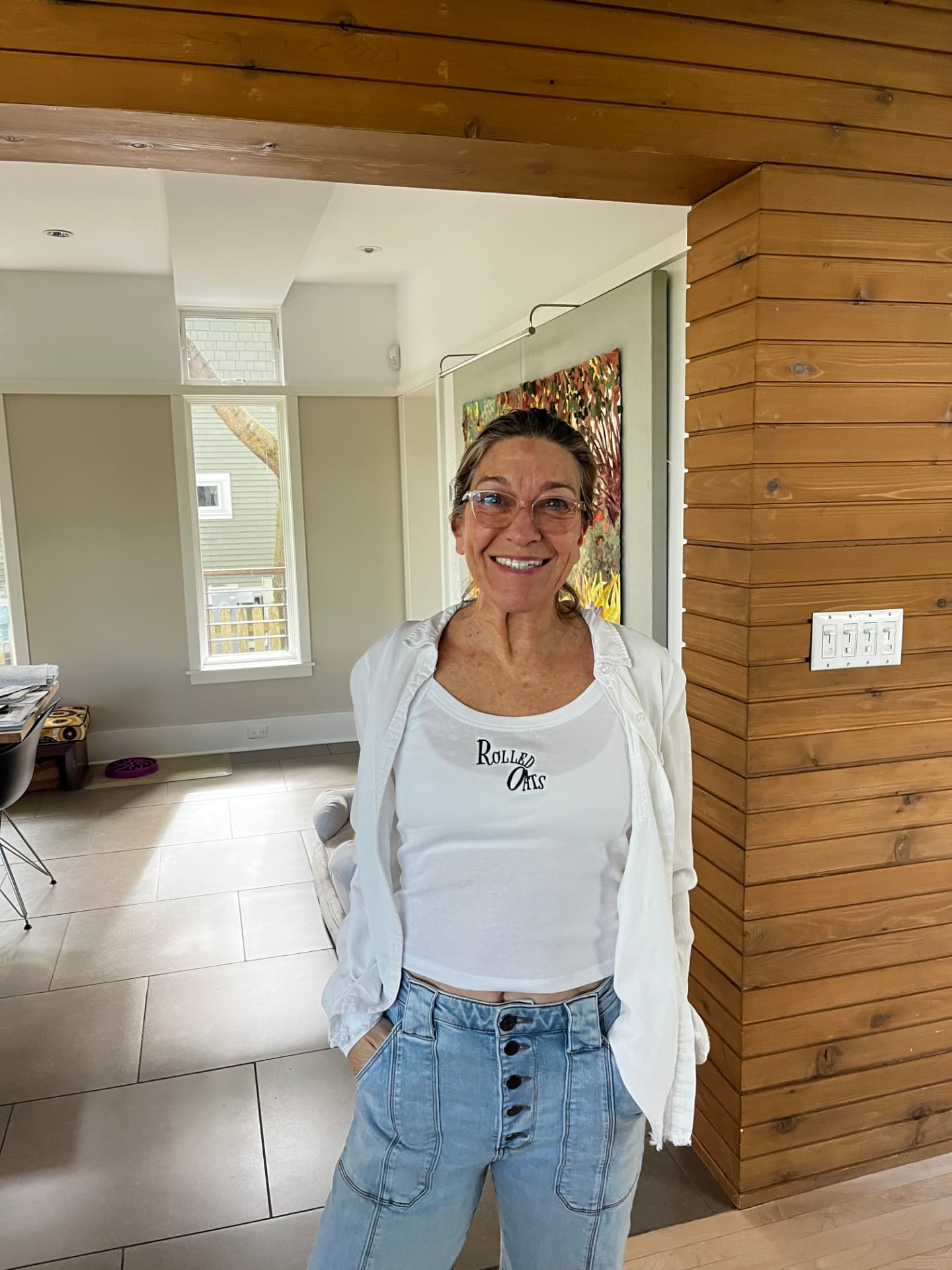 Cam's mother wearing a Rolled Oats tee